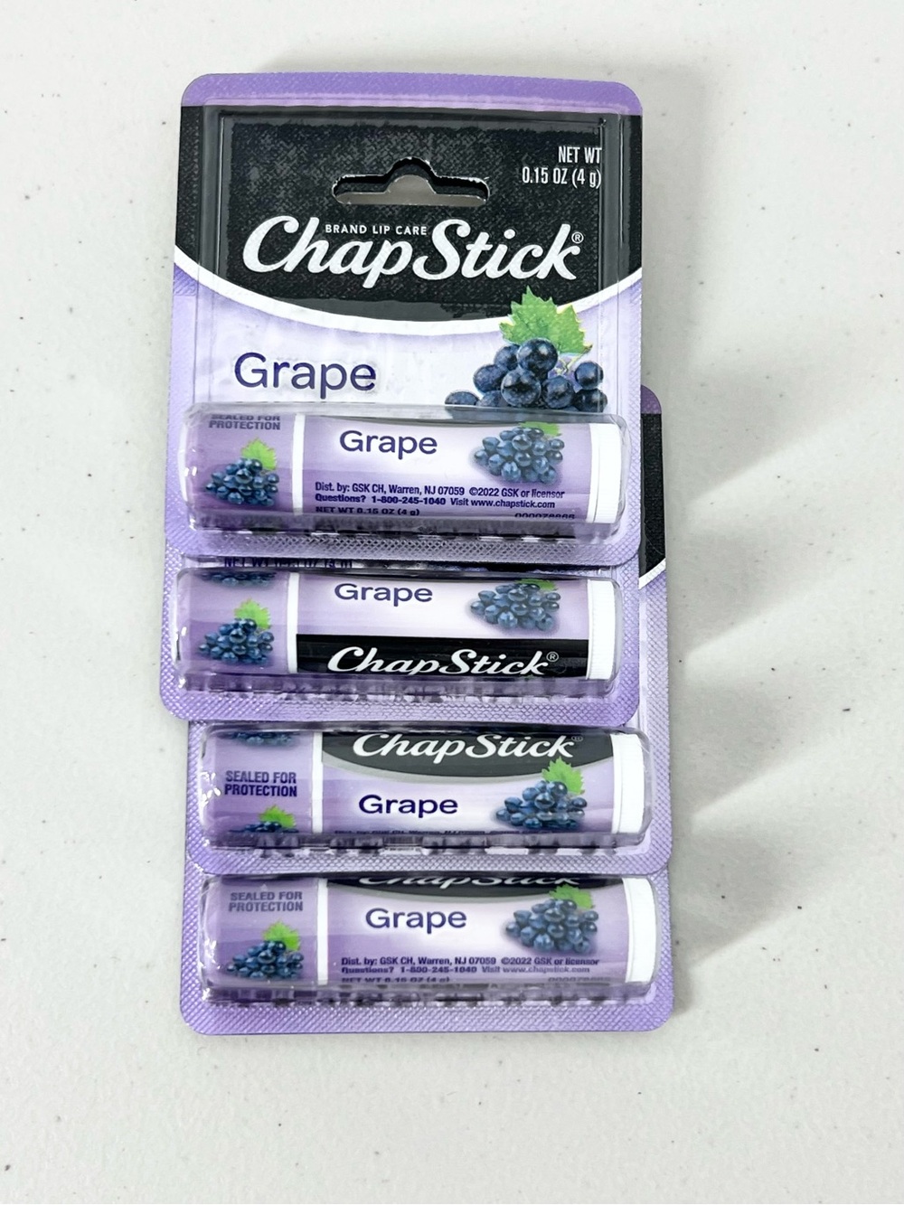 New Lot of 4 ChapStick Grape Flavor Lip Balm Sealed